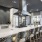 Resident lounge and dining area at our active adult community in New Braunfels, featuring counter seating and a gas range.