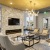 Resident lounge at our senior living community in New Braunfels, featuring cushioned chairs and a fireplace.